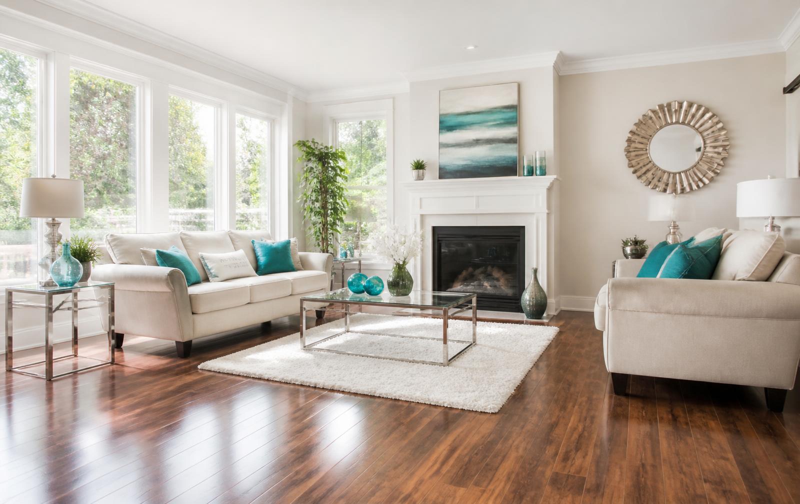 Bright, freshly cleaned living room with gleaming hardwood floors